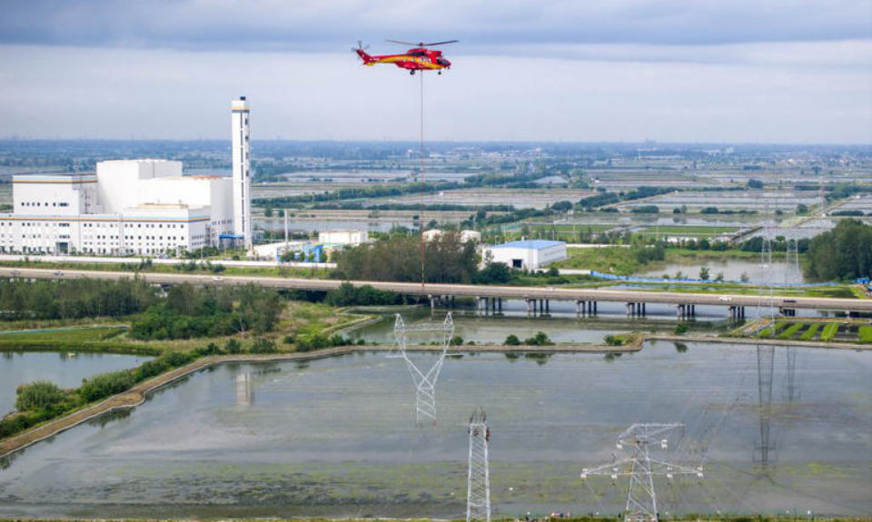 The Nanjinger - Helicopter Deployed for Erection of Electricity Pylon Tower in Taizhou