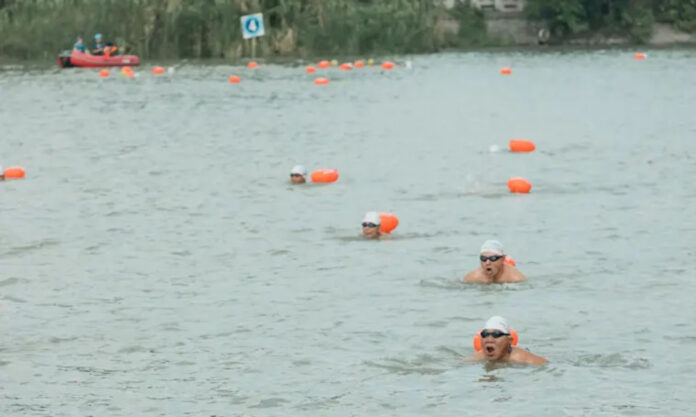 The Nanjinger - 500 Swimmers from all over China Take to Grand Canal in Yangzhou