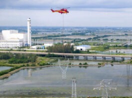 The Nanjinger - Helicopter Deployed for Erection of Electricity Pylon Tower in Taizhou
